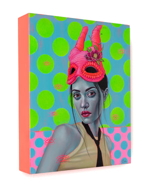 45 degree view of panel with fluorescent color portrait of a woman wearing a pink horned mask and a black tie and sleeveless top in front of a background of green spots on blue and blue spots on pink and scattered red eye outline symbols.