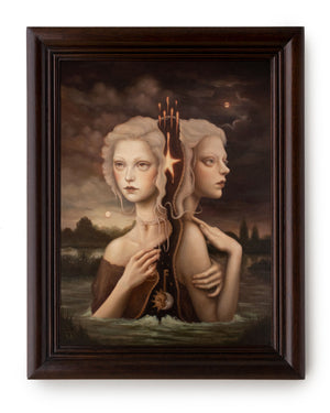 Framed view of a surreal painting in brown tones of two women entwined by their hair representing night and day while up to their belly in crashing waves.